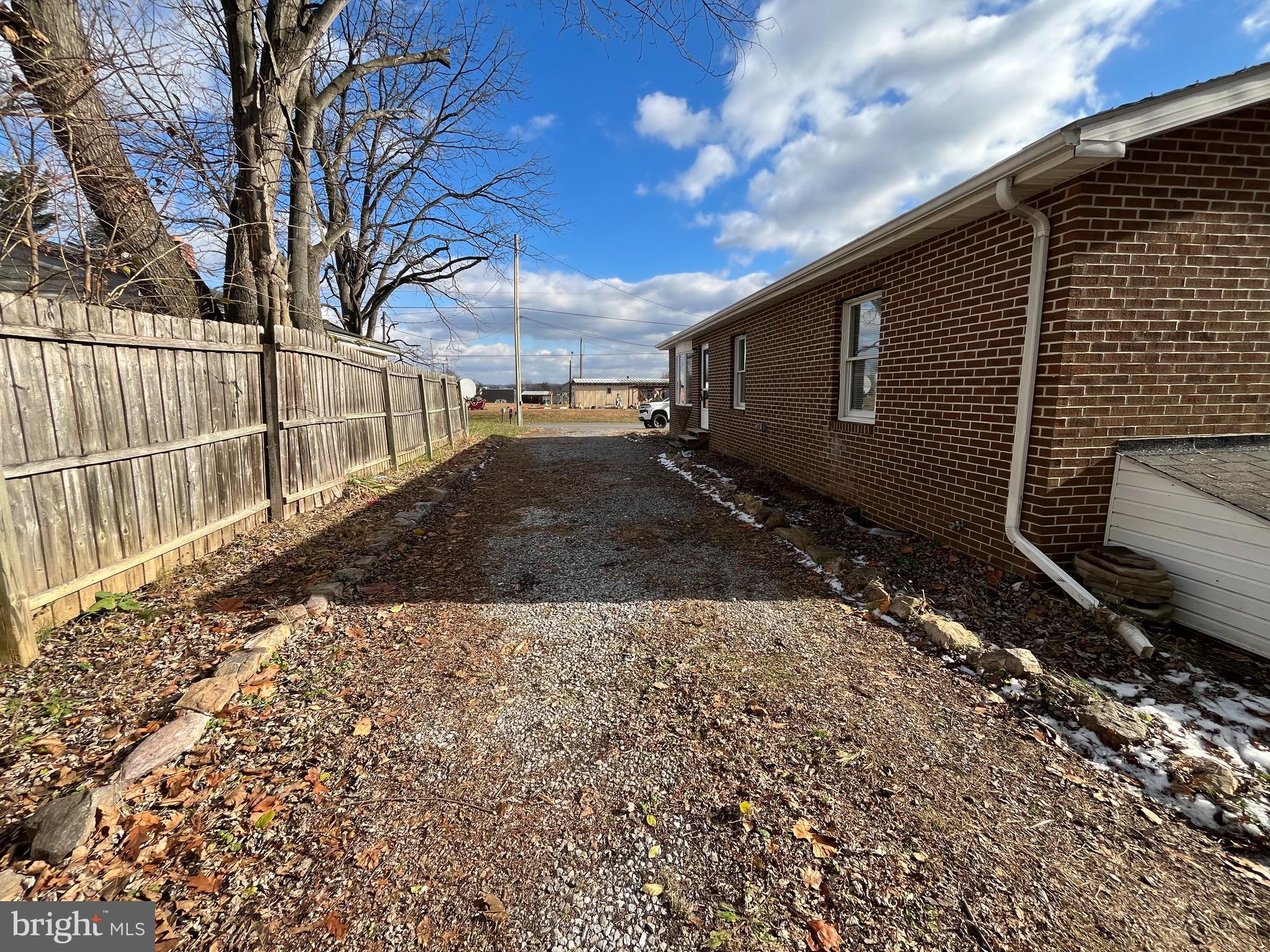 16944 Shinham Road Hagerstown, MD 21740 - Photo 24 of 29 a view of a backyard with a large tree