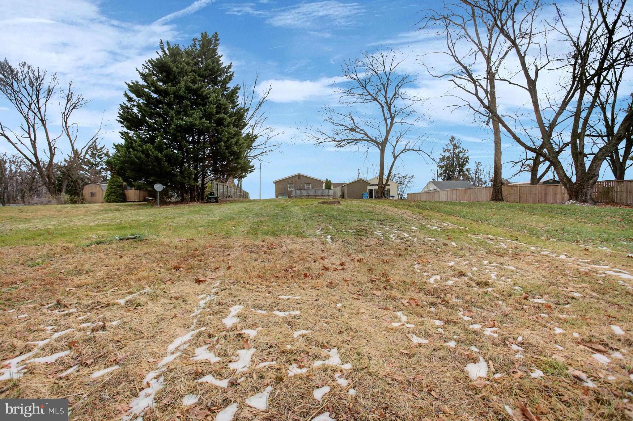 16944 Shinham Road Hagerstown, MD 21740 - Photo 26 of 29 a view of a field with large trees