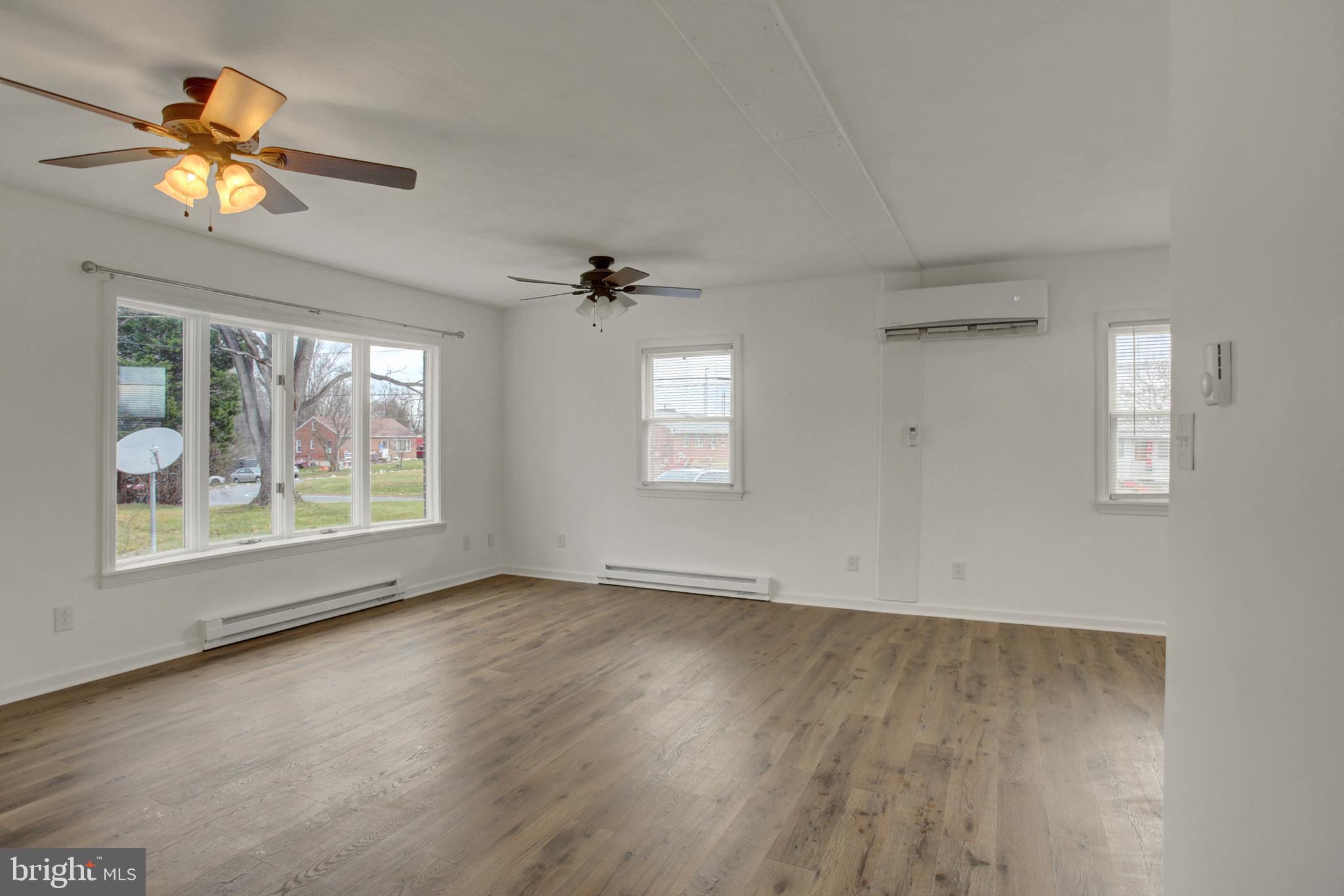 16944 Shinham Road Hagerstown, MD 21740 - Photo 9 of 29 a view of an empty room with a window