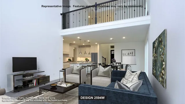 a living room with furniture a flat screen tv and kitchen view