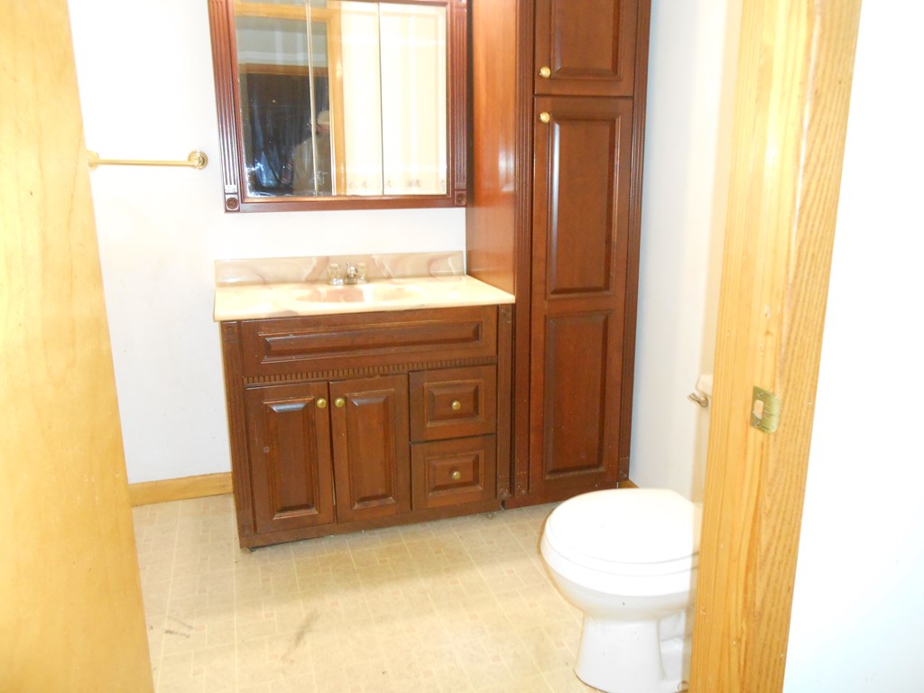 1312 Mercer Road Franklin, PA 16323 - Photo 9 of 15 a bathroom with a sink and a mirror