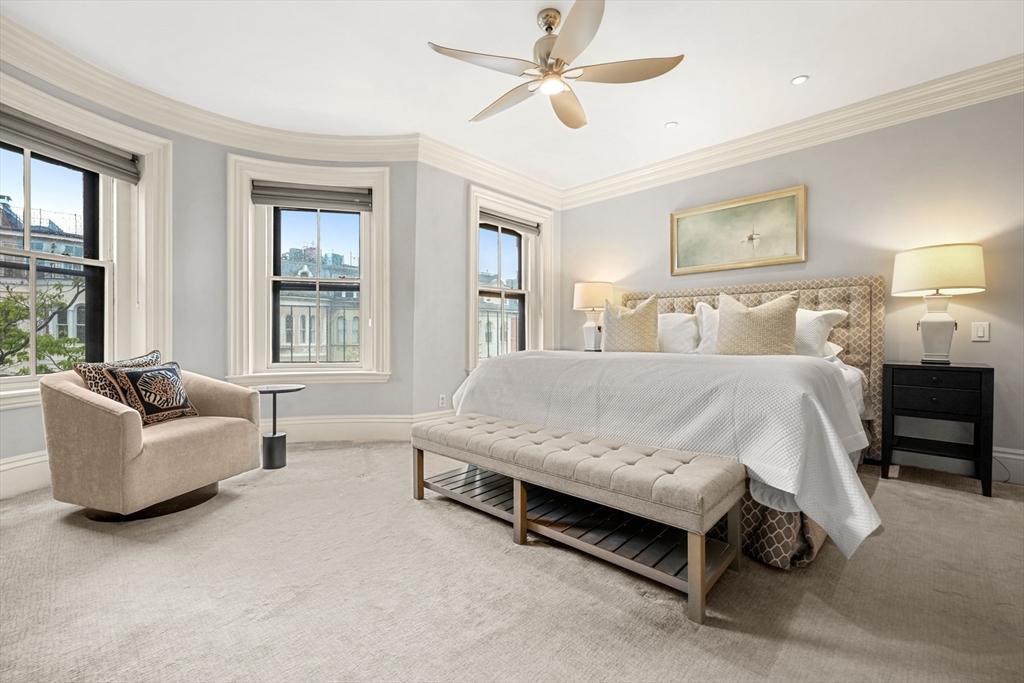 22 Rutland Square, Unit 2 Boston, MA 02118 - Photo 20 of 42 a bedroom with a bed couch and window