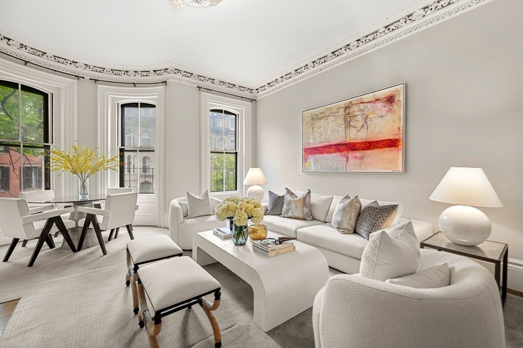 22 Rutland Square, Unit 2 Boston, MA 02118 - Photo 2 of 42 a living room with furniture and a large window