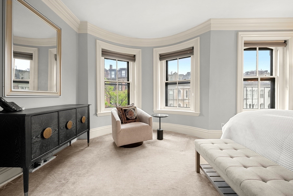 22 Rutland Square, Unit 2 Boston, MA 02118 - Photo 21 of 42 a bedroom with furniture and a window