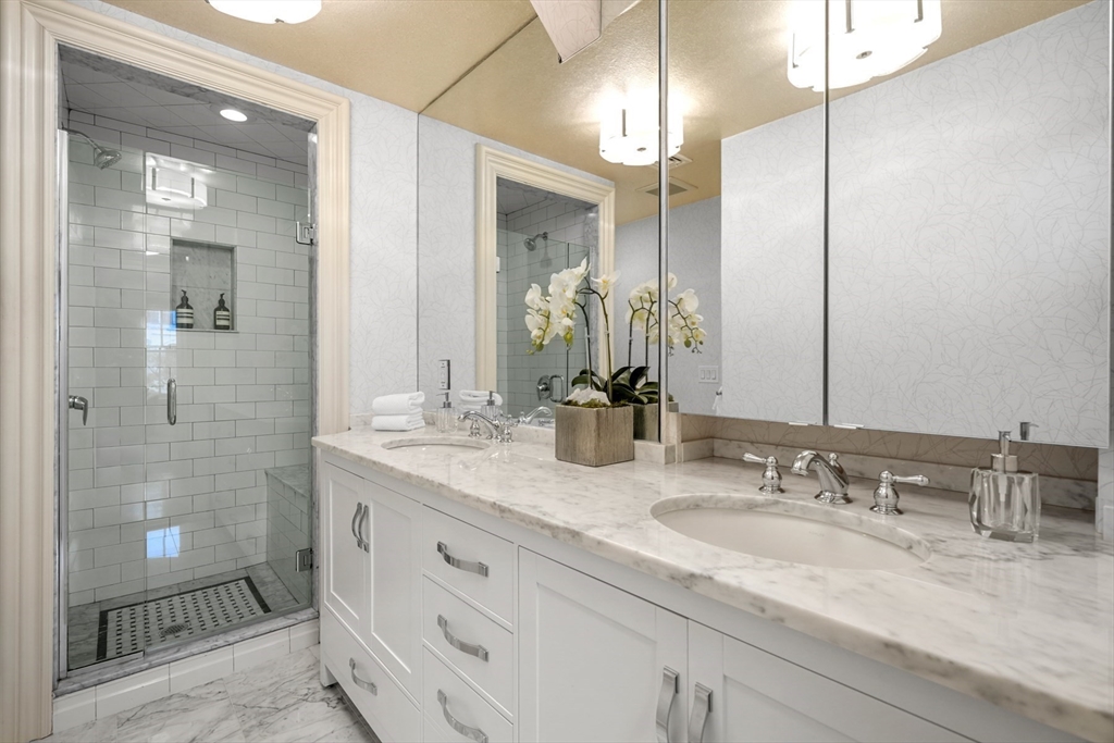 22 Rutland Square, Unit 2 Boston, MA 02118 - Photo 23 of 42 a bathroom with double vanity and a mirror