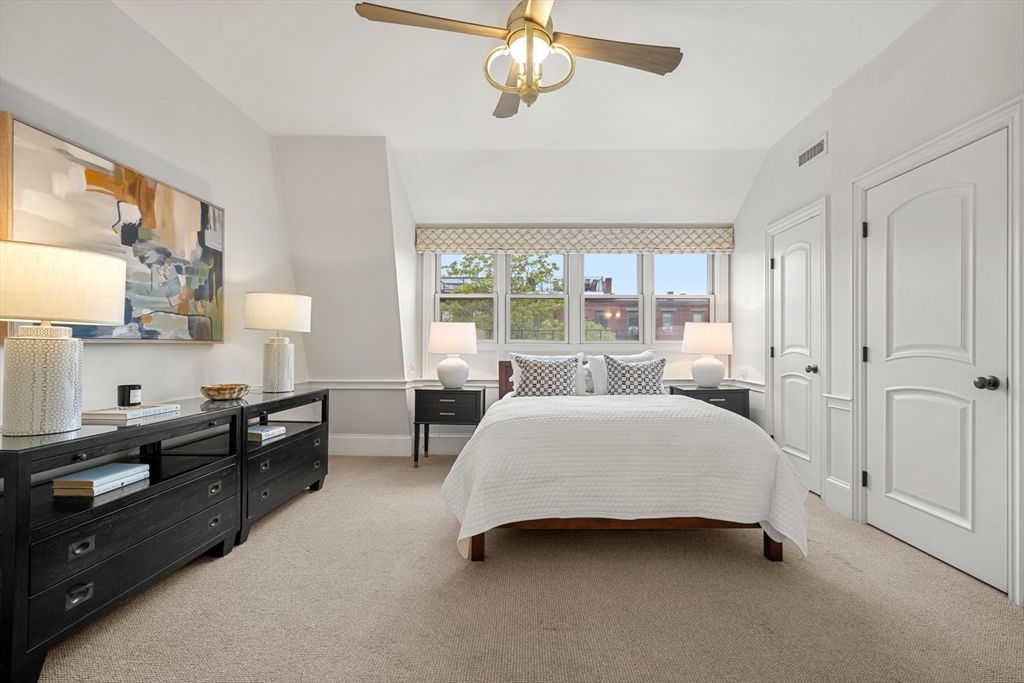 22 Rutland Square, Unit 2 Boston, MA 02118 - Photo 27 of 42 a bedroom with a bed and a window