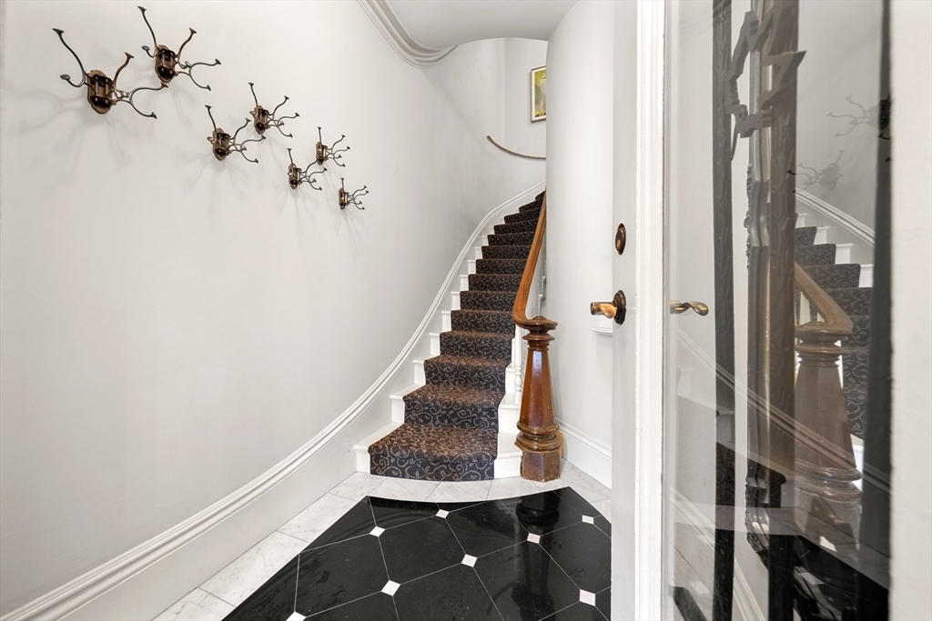 22 Rutland Square, Unit 2 Boston, MA 02118 - Photo 36 of 42 a view of entryway and hall with a chandelier