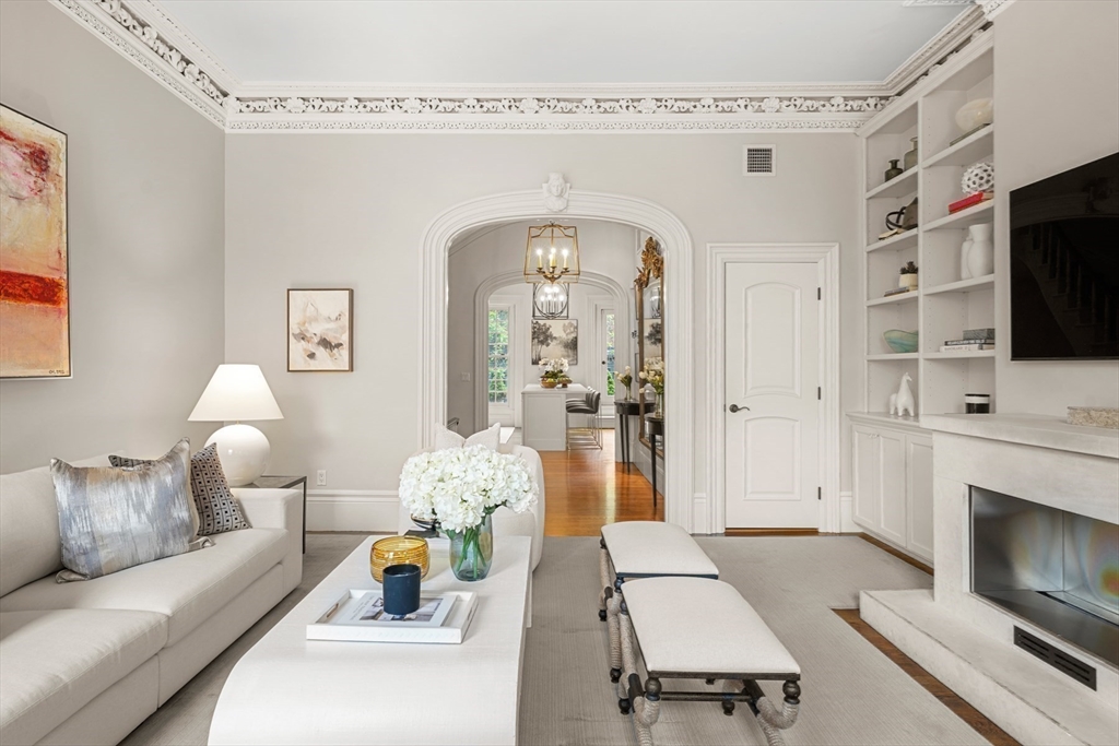 22 Rutland Square, Unit 2 Boston, MA 02118 - Photo 5 of 42 a living room with furniture fireplace and flat screen tv