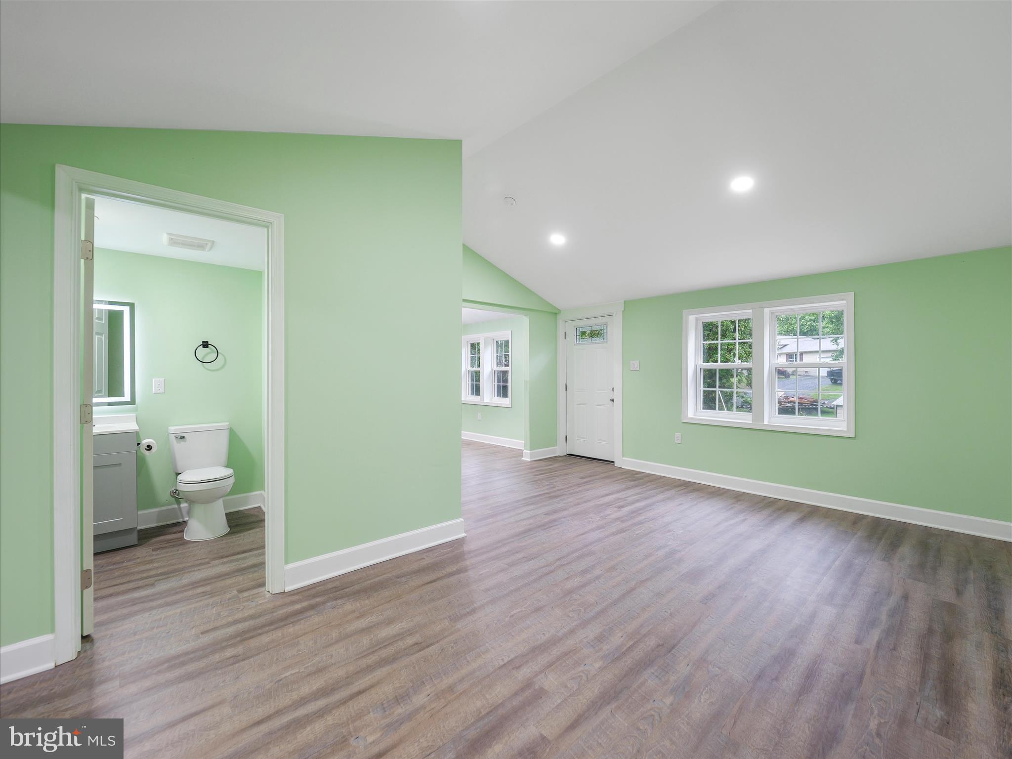 1712 Shenandoah River Drive Harpers Ferry, WV 25425 - Photo 13 of 25 a view of a room with wooden floor and a bathroom