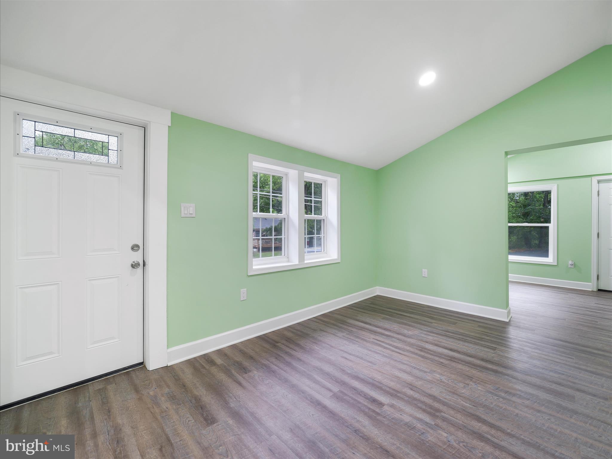1712 Shenandoah River Drive Harpers Ferry, WV 25425 - Photo 16 of 25 an empty room with wooden floor and windows