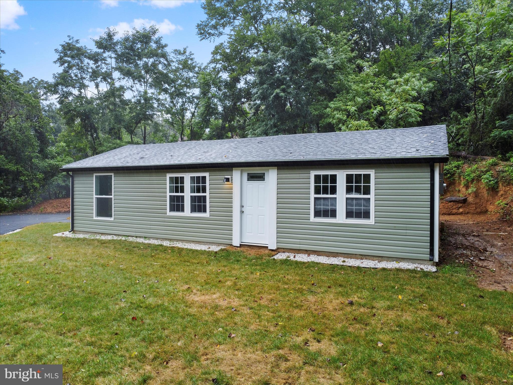 1712 Shenandoah River Drive Harpers Ferry, WV 25425 - Photo 3 of 25 a view of a house with a yard