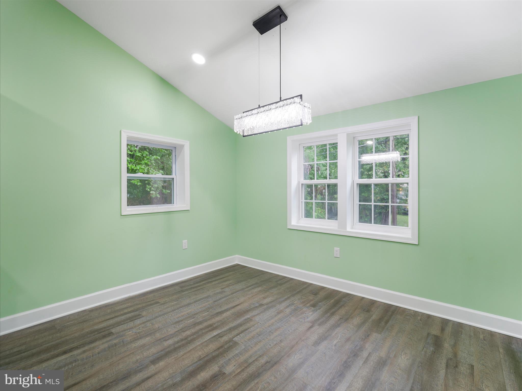 1712 Shenandoah River Drive Harpers Ferry, WV 25425 - Photo 10 of 25 a view of an empty room with wooden floor and a window