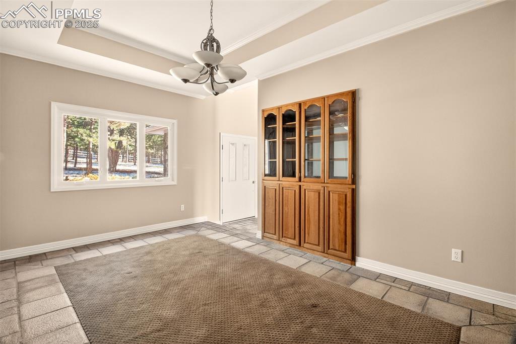 13950 Herring Road Colorado Springs, CO 80908 - Photo 17 of 50 a view of an empty room with a window