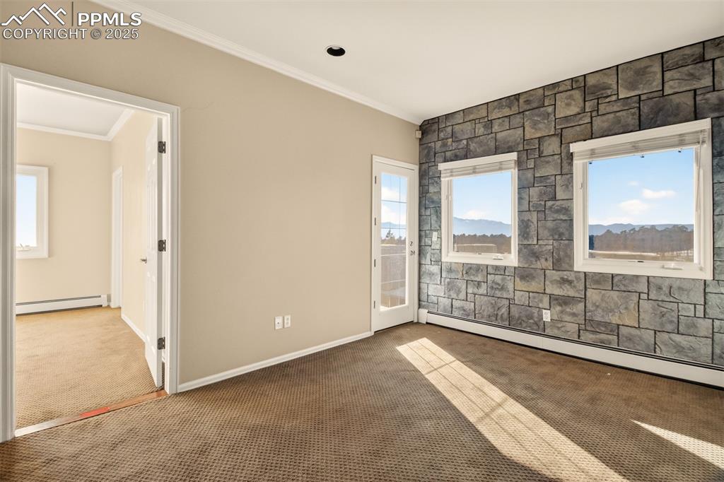 13950 Herring Road Colorado Springs, CO 80908 - Photo 27 of 50 a view of an empty room with window
