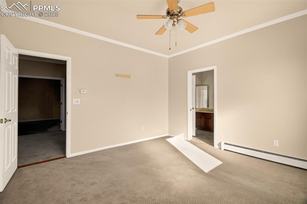 13950 Herring Road Colorado Springs, CO 80908 - Photo 32 of 50 an empty room with fan