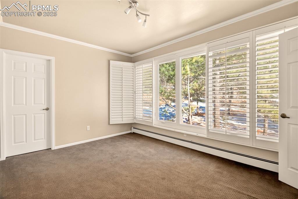 13950 Herring Road Colorado Springs, CO 80908 - Photo 34 of 50 a view of an empty room with a window