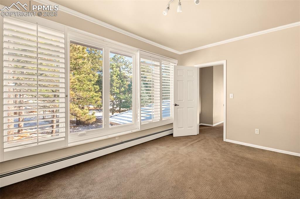 13950 Herring Road Colorado Springs, CO 80908 - Photo 35 of 50 a view of an empty room with a window