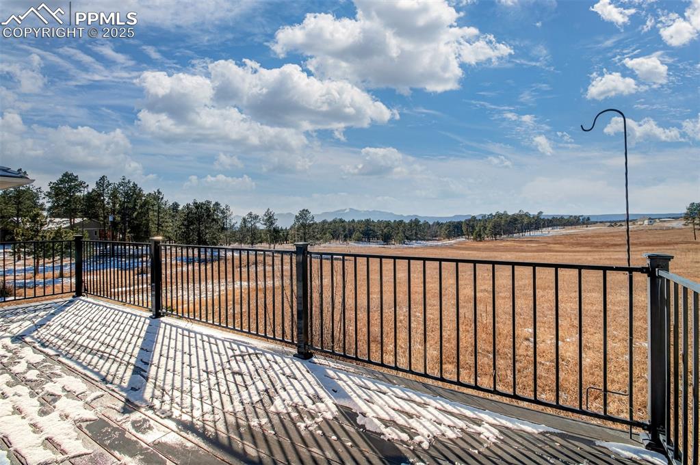13950 Herring Road Colorado Springs, CO 80908 - Photo 39 of 50 a view of balcony with staircase