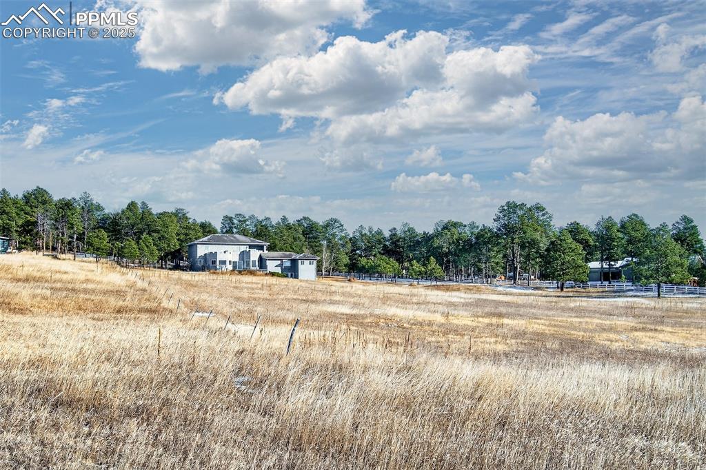 13950 Herring Road Colorado Springs, CO 80908 - Photo 50 of 50 a view of a lake and a yard