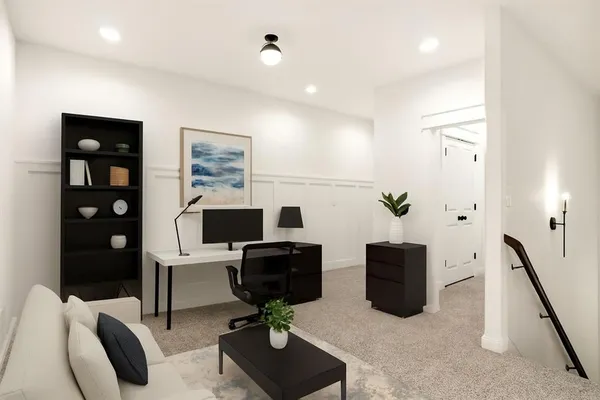 a view of a workspace with furniture