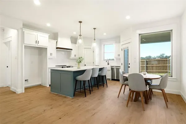 a view of kitchen with breakfast area