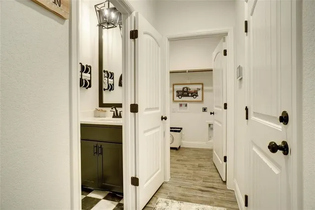 a bathroom with a shower and a sink