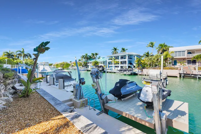 a floor to ceiling window and outdoor seating