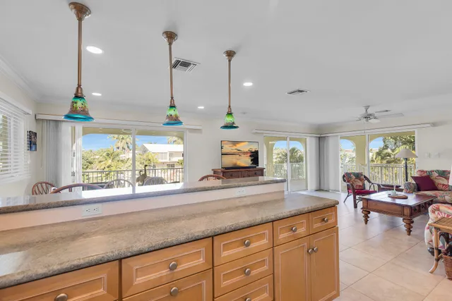 a kitchen with sink and window