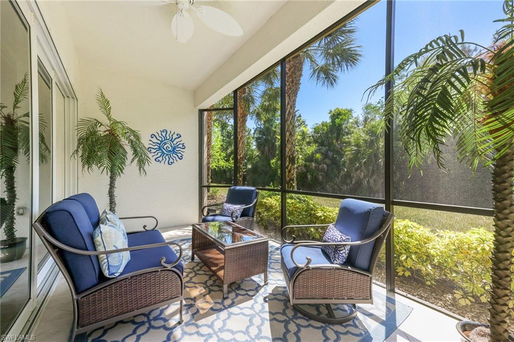 7849 Hawthorne Drive, Unit 802 Naples, FL 34113 - Photo 34 of 49 Sunroom with ceiling fan
