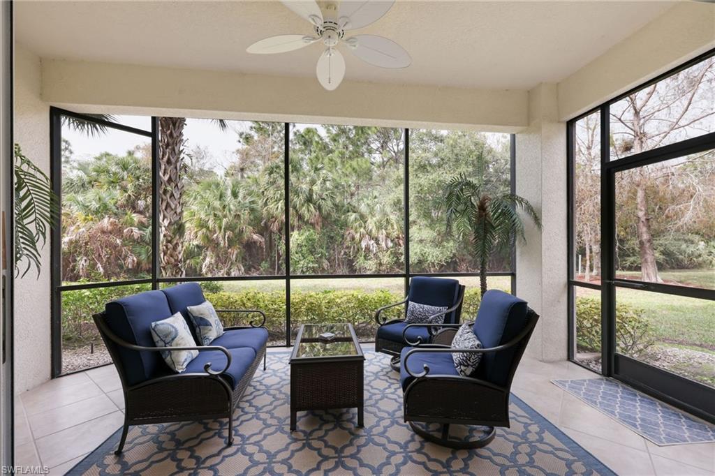 7849 Hawthorne Drive, Unit 802 Naples, FL 34113 - Photo 35 of 49 Sunroom with plenty of natural light