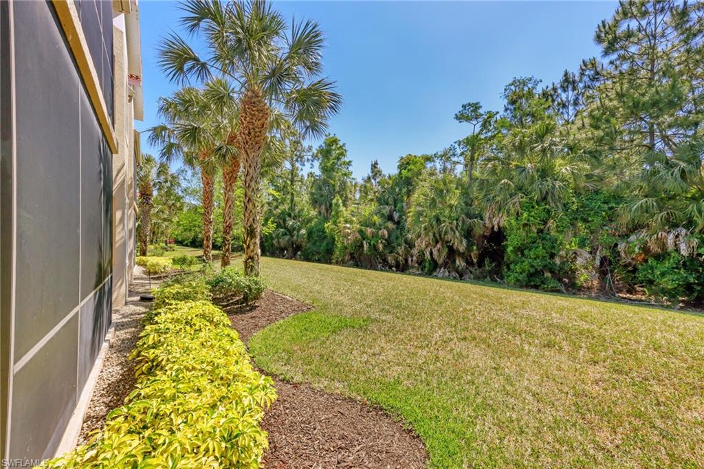 7849 Hawthorne Drive, Unit 802 Naples, FL 34113 - Photo 36 of 49 View of yard