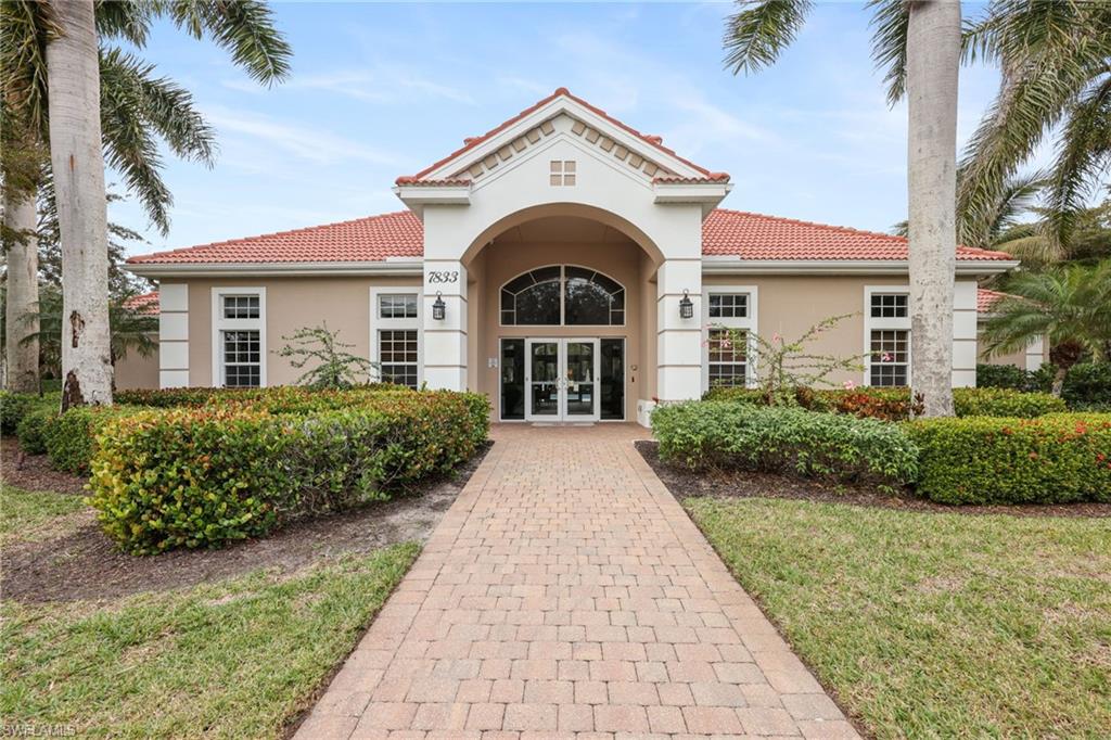 7849 Hawthorne Drive, Unit 802 Naples, FL 34113 - Photo 46 of 49 View of community clubhouse a short walk away!