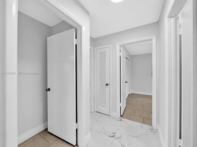 a view of a chandelier fan in a room