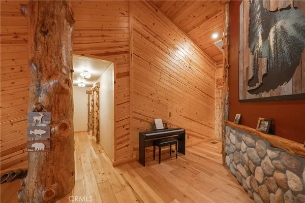 a bedroom with a bed a window and closet