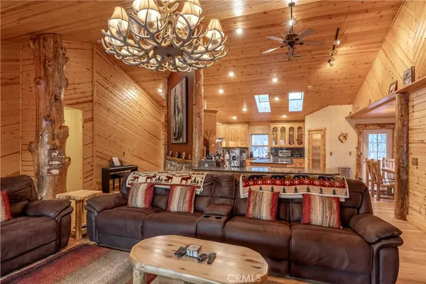 a view of living room with furniture and a window