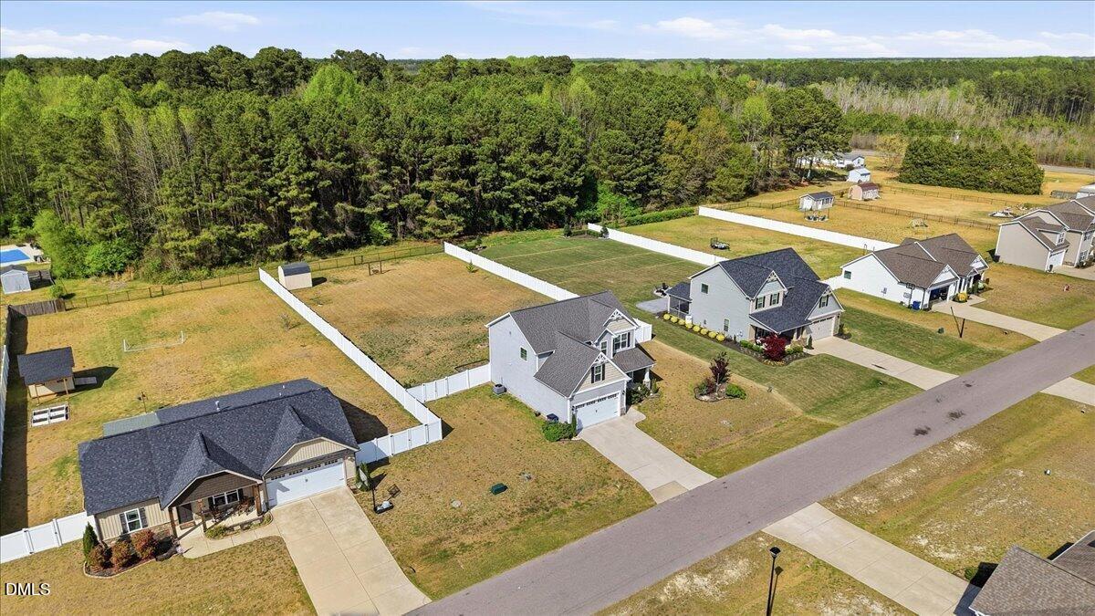 136 Fallingbrook Drive Kenly, NC 27542 - Photo 4 of 7 a view of a swimming pool with a patio