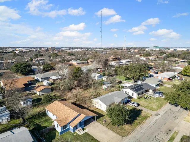 an aerial view of residential house with parking space