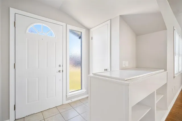 a view of a kitchen with a sink and a dishwasher