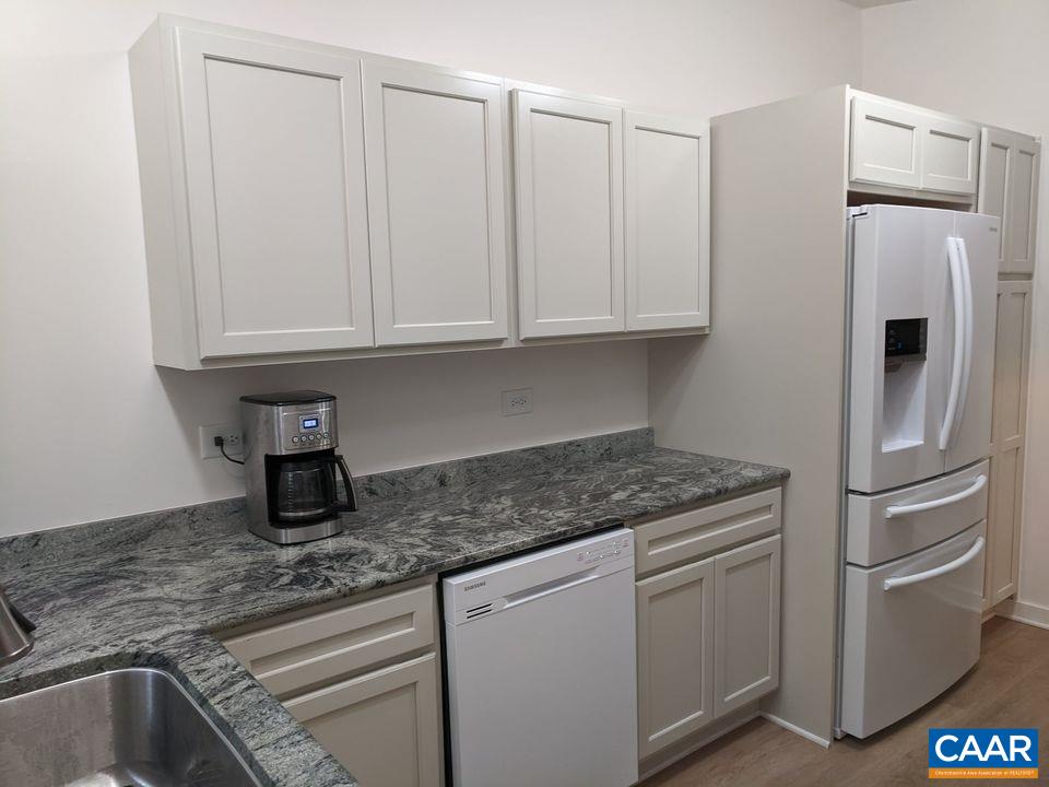 25 Stonefield Road Palmyra, VA 22963 - Photo 6 of 15 a kitchen with stainless steel appliances granite countertop a refrigerator and a sink