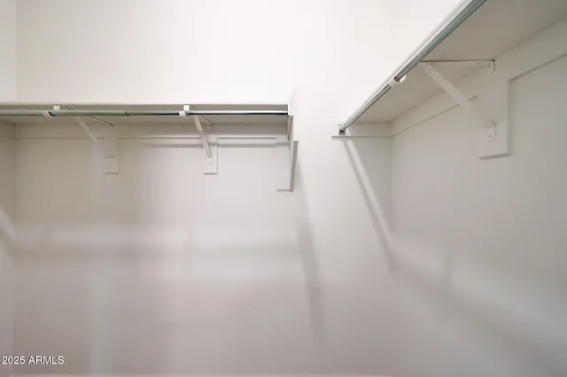 a close view of a utility room with washer and dryer