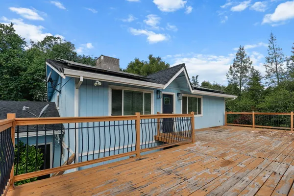 a view of a house with a roof deck