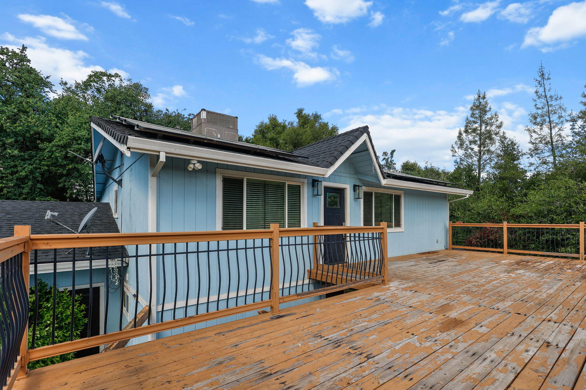 a view of a house with a roof deck