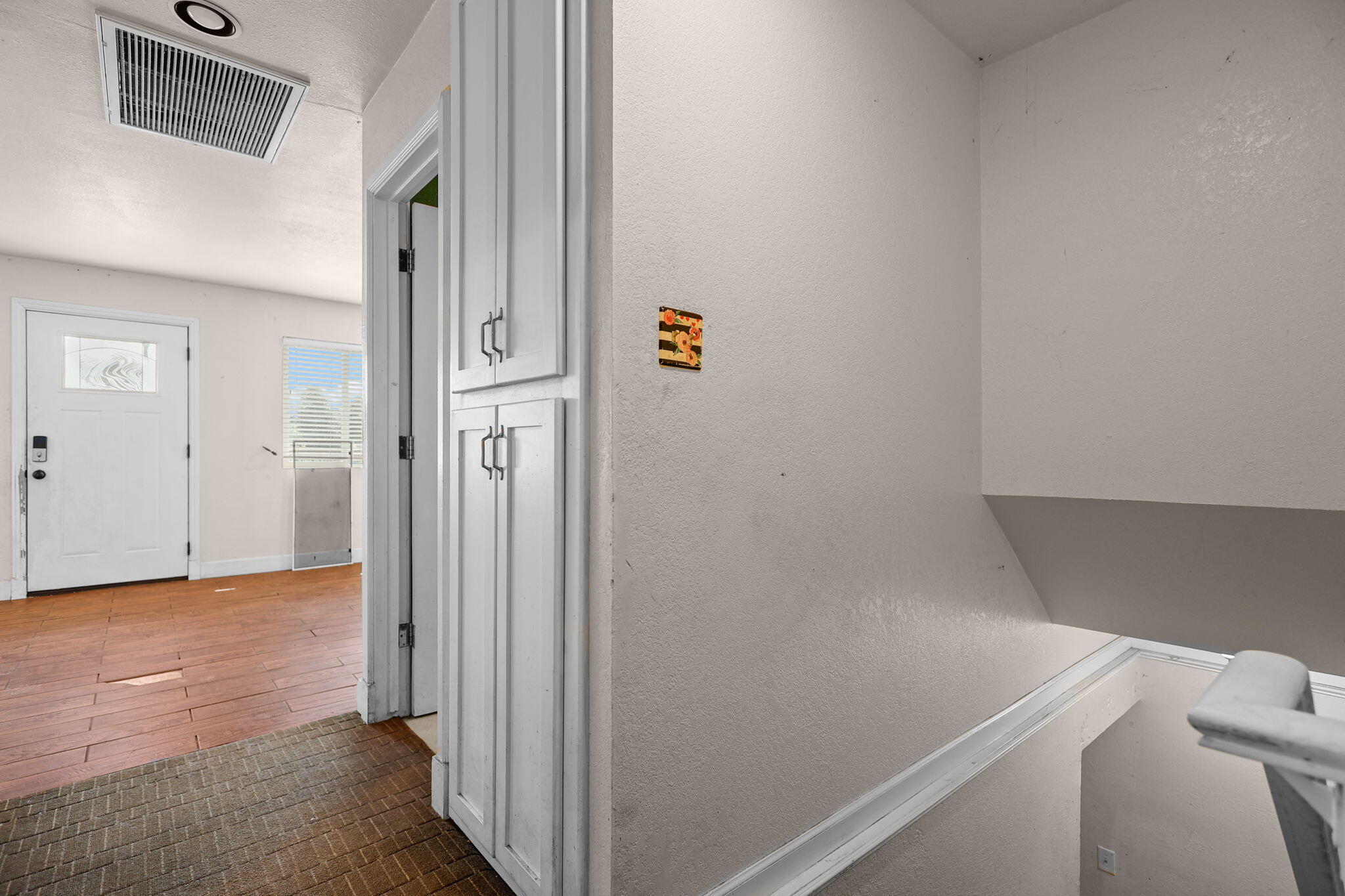 18855 Turnell Road Cottonwood, CA 96022 - Photo 13 of 34 a view of a hallway with wooden floor