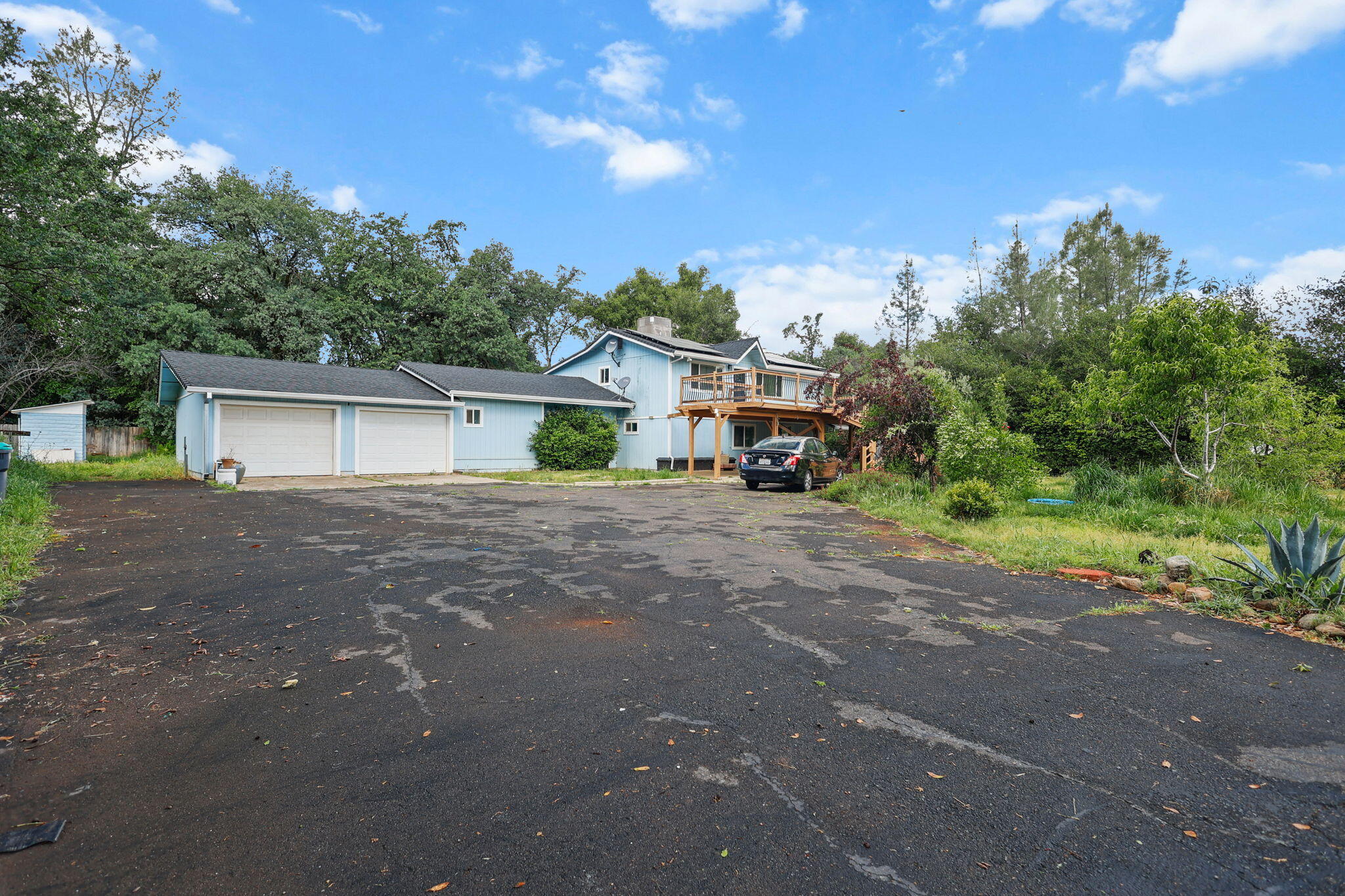 18855 Turnell Road Cottonwood, CA 96022 - Photo 26 of 34 a view of a house with a yard