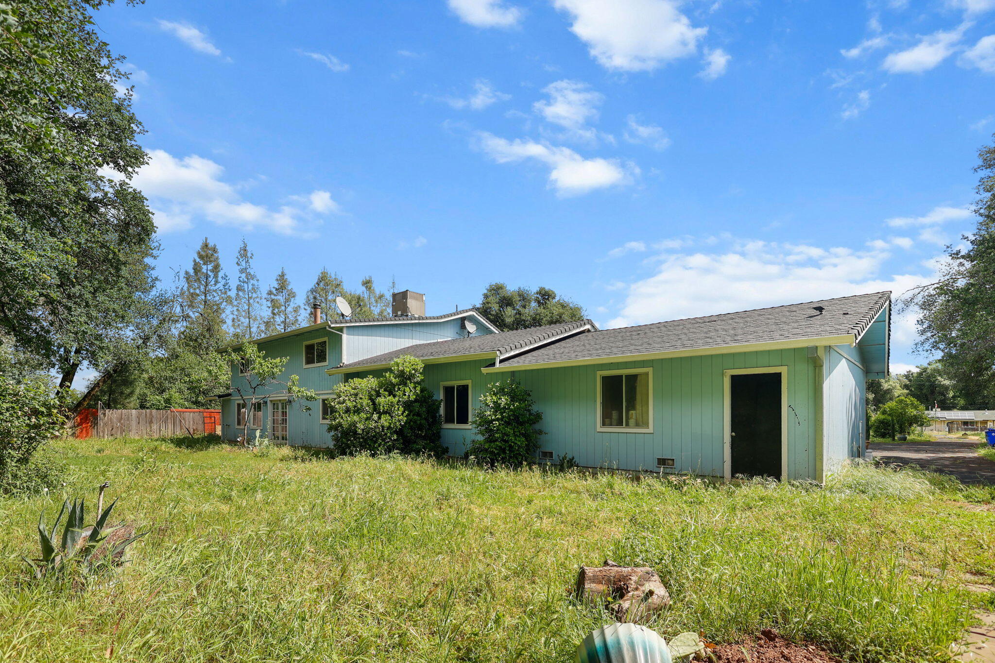 18855 Turnell Road Cottonwood, CA 96022 - Photo 30 of 34 a view of a house with a backyard