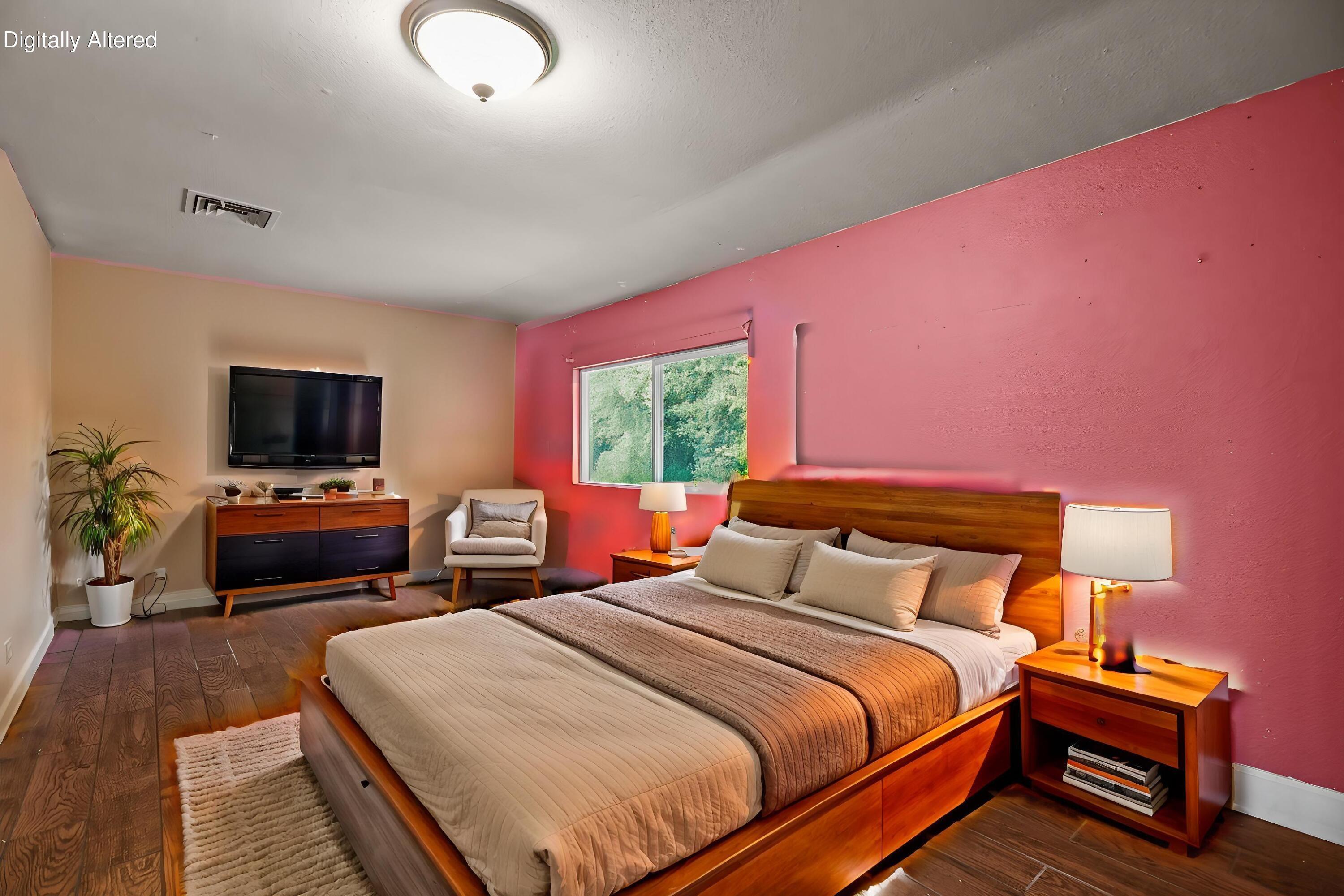 18855 Turnell Road Cottonwood, CA 96022 - Photo 10 of 34 a bedroom with a bed and a flat screen tv