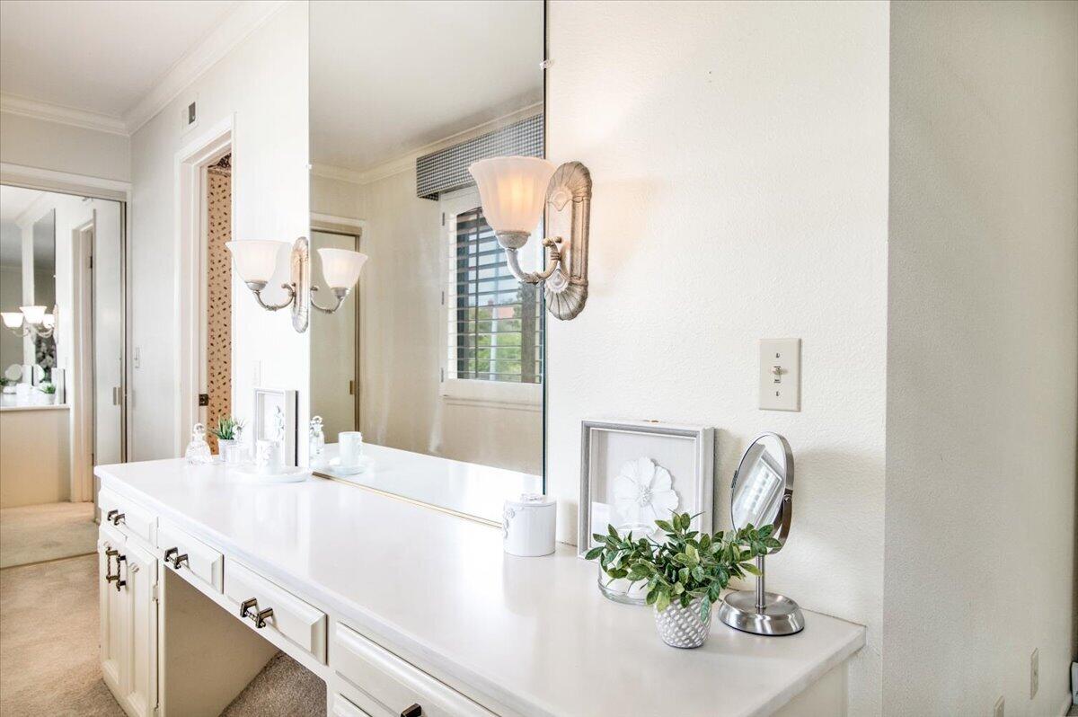 4603 Falcon Drive Lompoc, CA 93436 - Photo 33 of 45 a bathroom with a sink a mirror and a potted plant