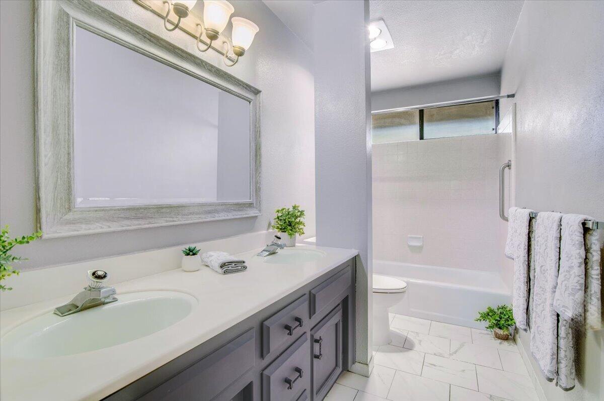 4603 Falcon Drive Lompoc, CA 93436 - Photo 41 of 45 a bathroom with a sink and a mirror