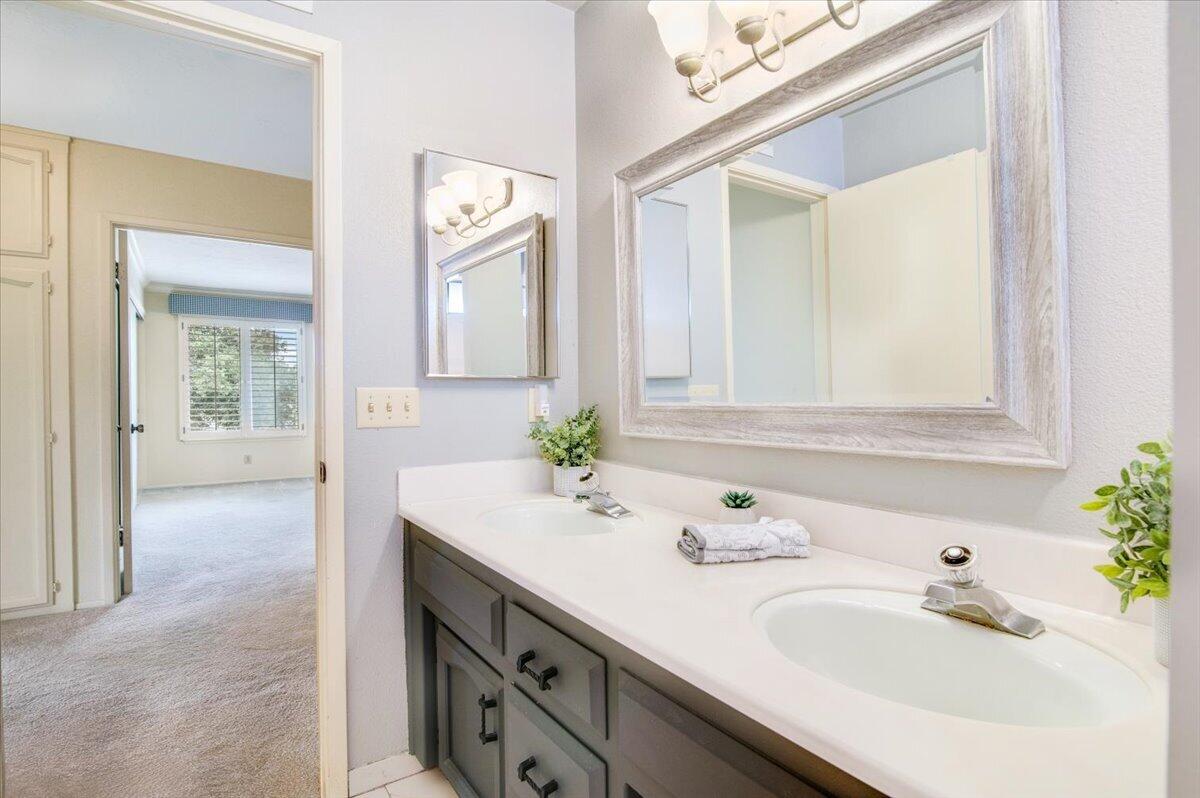 4603 Falcon Drive Lompoc, CA 93436 - Photo 42 of 45 a bathroom with a sink and a mirror