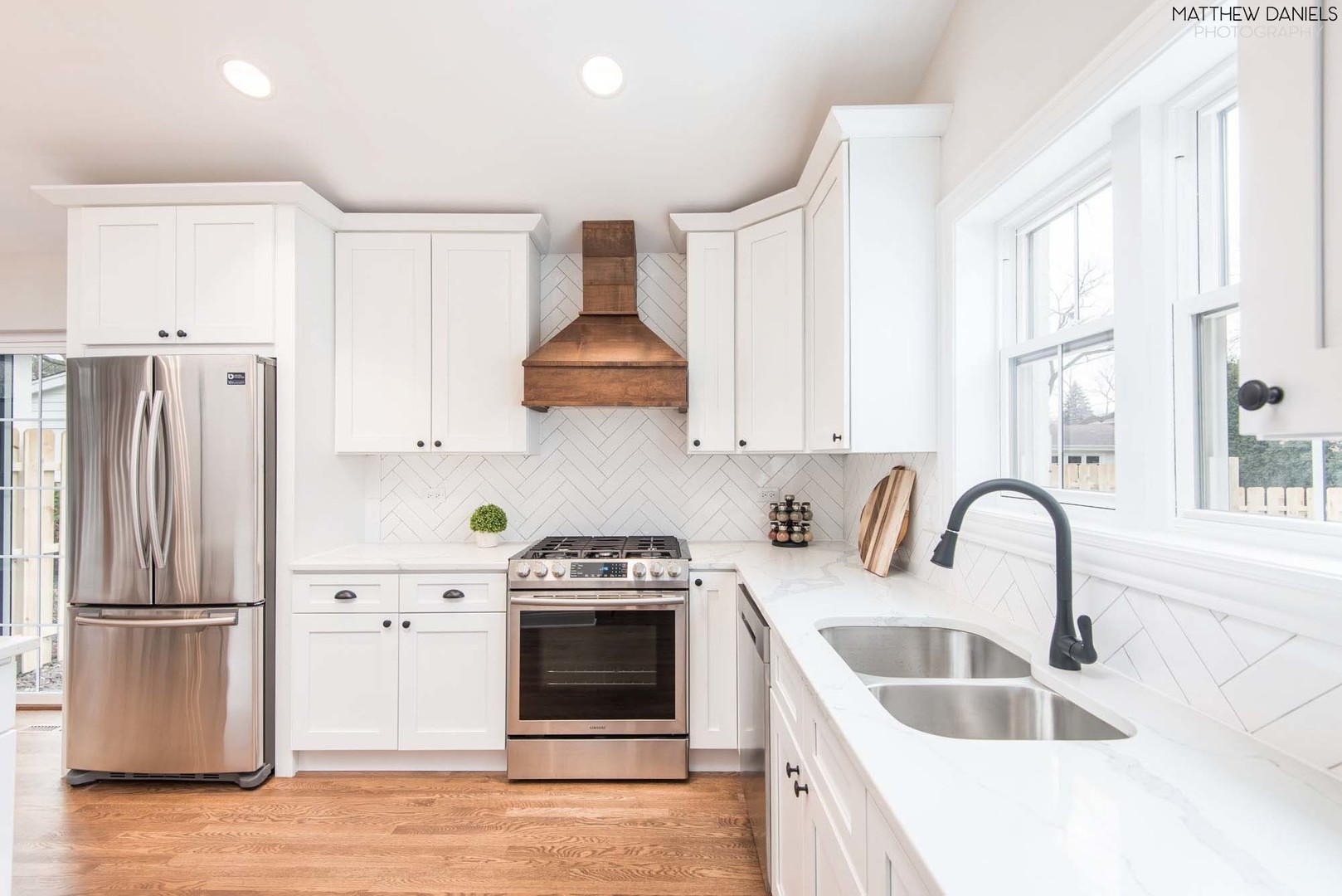 426 Shermer Road Glenview, IL 60025 - Photo 14 of 52 a kitchen with granite countertop a sink and a refrigerator